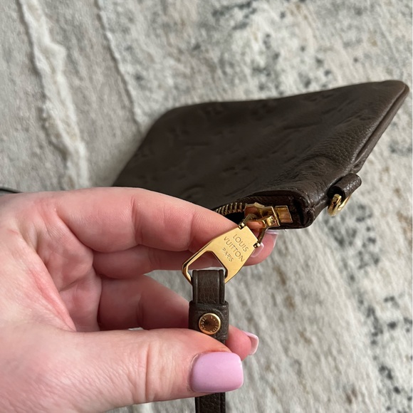 Like ๐ Louis Vuitton Empriente Citadine leather muted taupe mini pouch wristlet - Picture 16 of 17